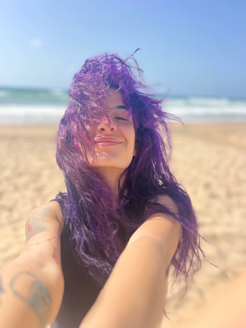 Veronica in Purple - Portrait of a woman with authentic presence and gentle strength